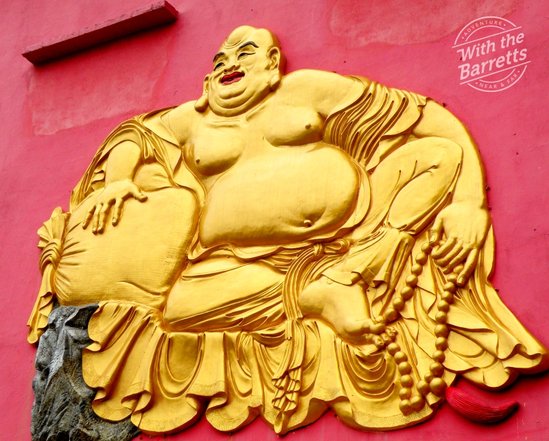 Wall relief of corpulent Buddha