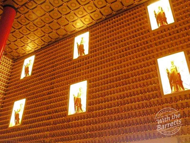 Wall of Buddhas with lights and shadows