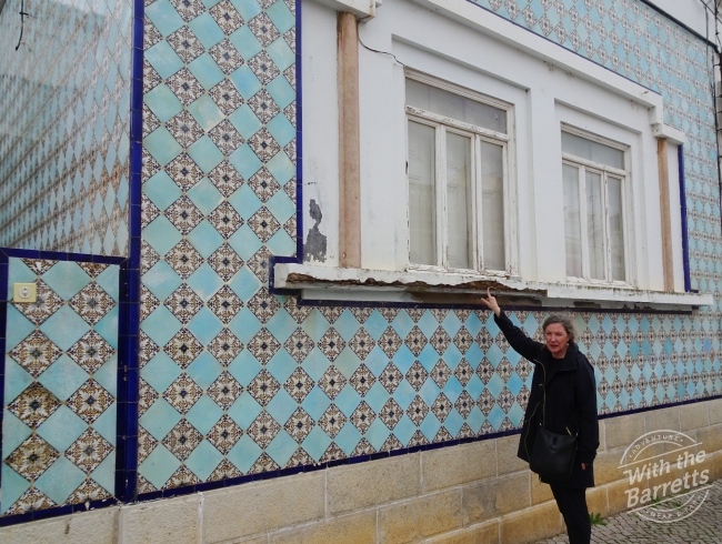 tile exterior with window ledge in disrepair