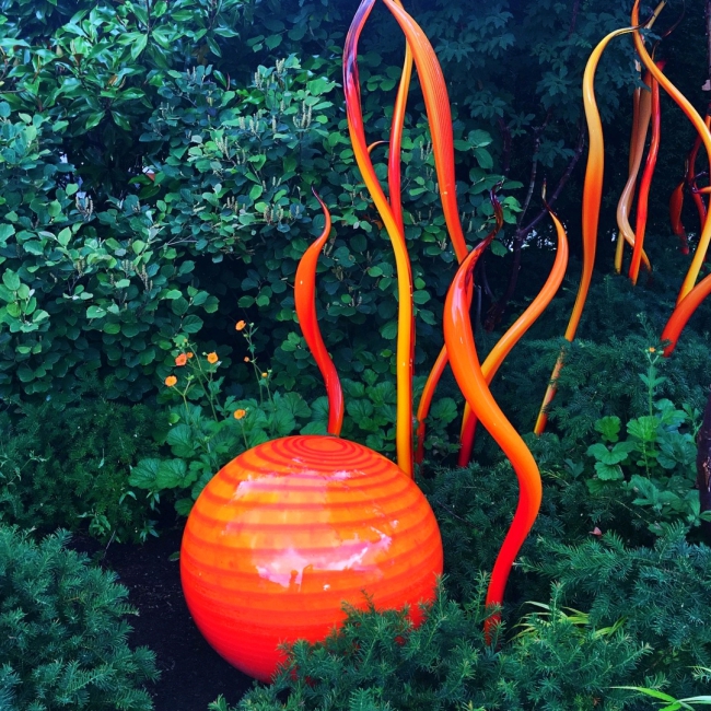 Orange sphere with nearby tendrils