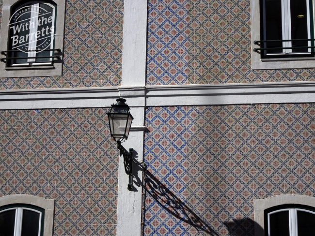 Sun-faded tile cladding